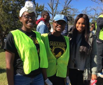 Volunteers helping to clean up a neighborhood
